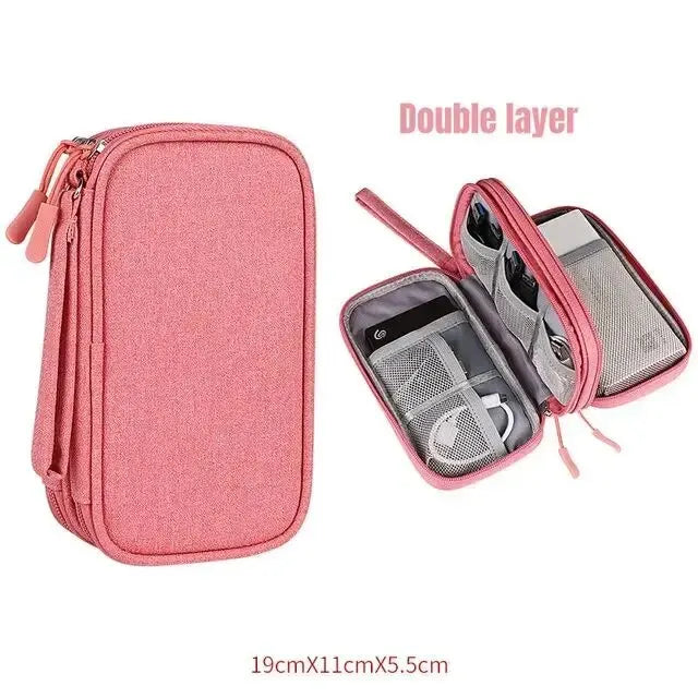 A pink double-layer travel organizer pouch for cables and accessories.