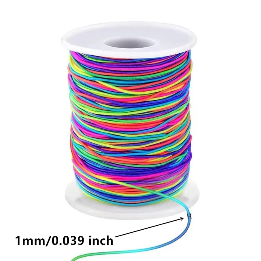 A spool of 1mm elastic stretchy cord in various bright colors for jewelry making