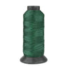 A spool of dark green heavy-duty nylon sewing thread for upholstery and denim.