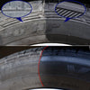 Close-up view of a tire tread and rim with HP branding and tubeless radial text.