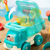 A teal beach toy set featuring a plastic beach cart filled with various sand and sea creatures for children.