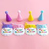 A set of pet birthday party hats and bibs in purple, pink, yellow, and blue for cats and small dogs