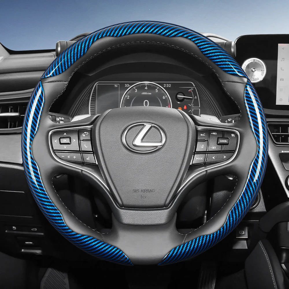 A black steering wheel with blue carbon fiber texture accents and controls in a car interior.