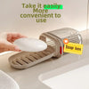 A hand is holding a portable travel soap box with a drainage lid, demonstrating its easy use.