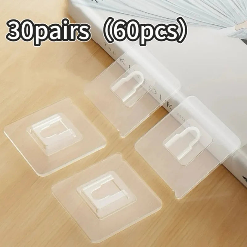 30 pairs of transparent double-sided adhesive wall hooks packaged in a white box.