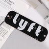 A black USB-powered LED sign shaped like the word LYFT, featuring individual light bulbs.