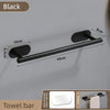 A black double-sided adhesive stainless steel towel bar mounted on a wall, showing its dimensions.