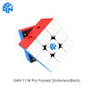 A black GAN 11 M Pro magnetic speed cube 3x3 with a blue and red frame.