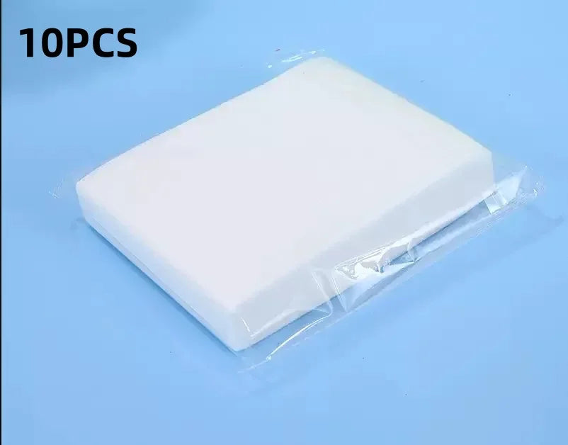 Ten pieces of white laundry color absorbing paper sheets packaged in clear plastic.