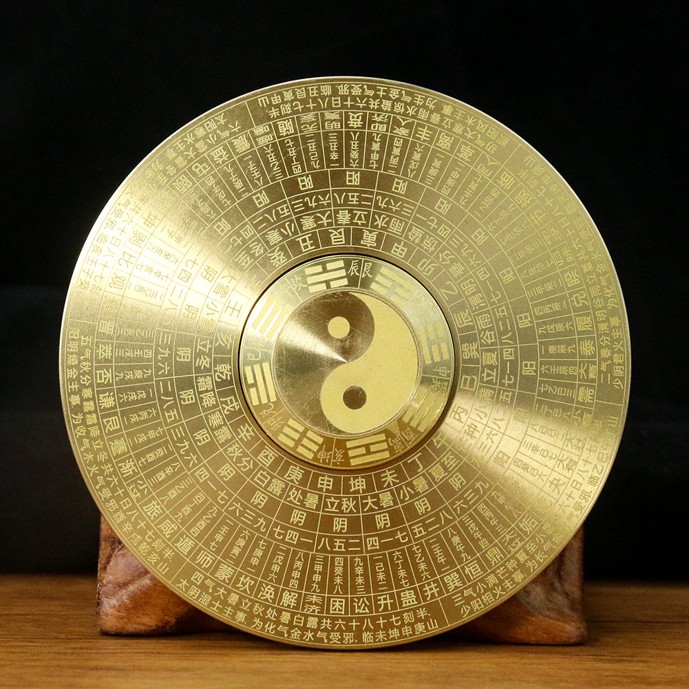 Solid brass Feng Shui compass featuring Yin Yang and eight trigrams engraved on the face.