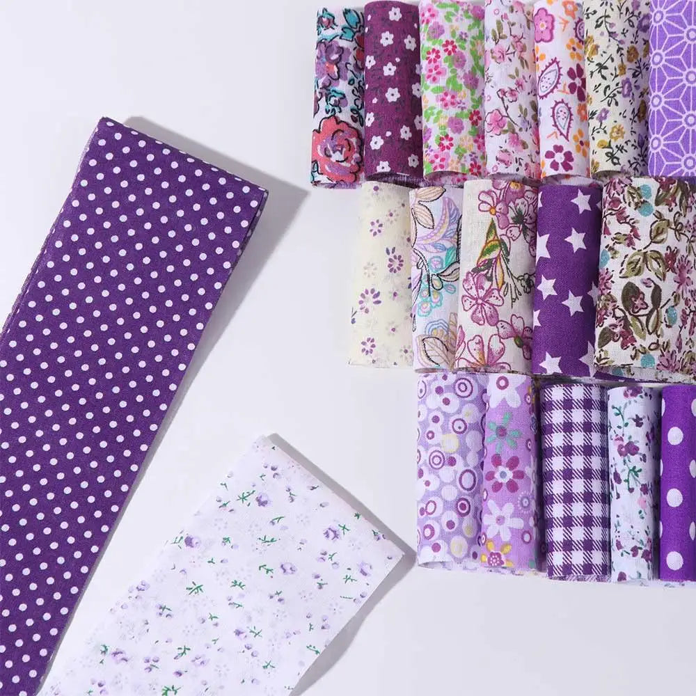 A collection of 40 floral cotton fabric strips in various patterns and colors for quilting and patchwork