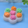 A set of silicone molds shaped like various colored roses and succulents for DIY crafts