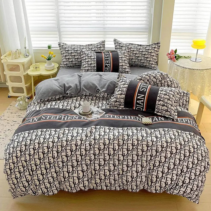 A black and white patterned bedding set featuring a duvet cover, fitted sheet, and pillows on a bed.
