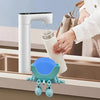 A white faucet dispenses water into a glass jar, with a blue sponge holder hanging over a kitchen sink.