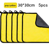 Five gray and yellow microfiber car cleaning towels stacked together.