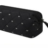 Black quilted storage bag for a portable hair dryer and styling tool.