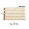 A light beige velvet jewelry organizer tray with four detachable compartments.