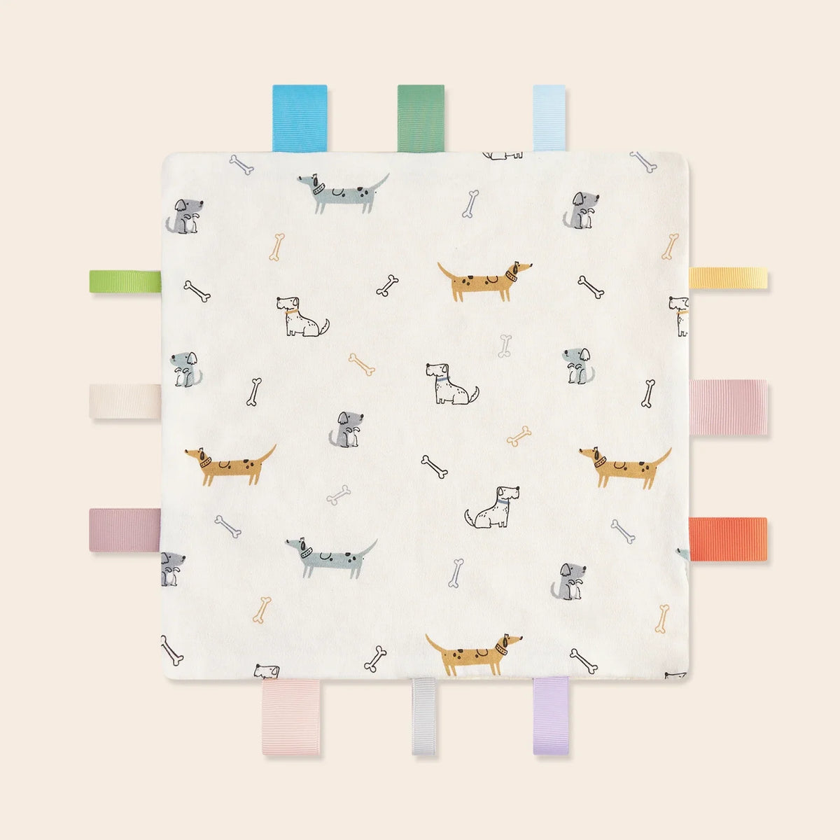 A white baby sensory tag comfort blanket featuring various dog and cat illustrations with colorful wooden tags.