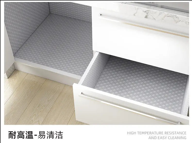 A white kitchen cabinet with a glass shelf showing a gray patterned surface, labeled as high temperature resistance and easy 