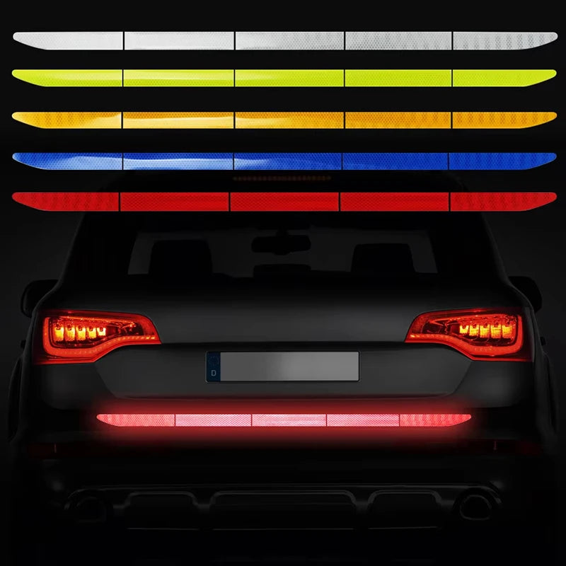 A row of colored reflective safety tapes displayed horizontally against a dark background.