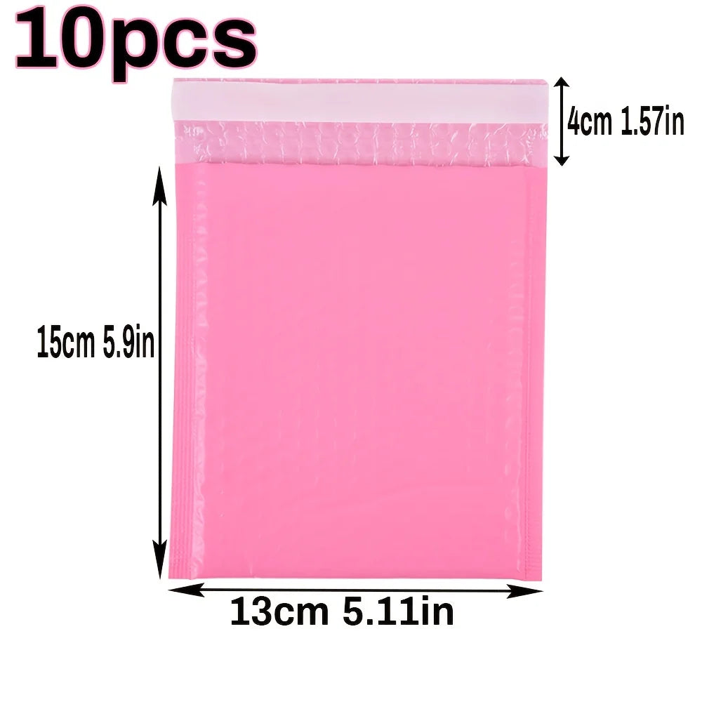 Ten pink self-seal padded bubble mailers measuring 15cm by 13cm.