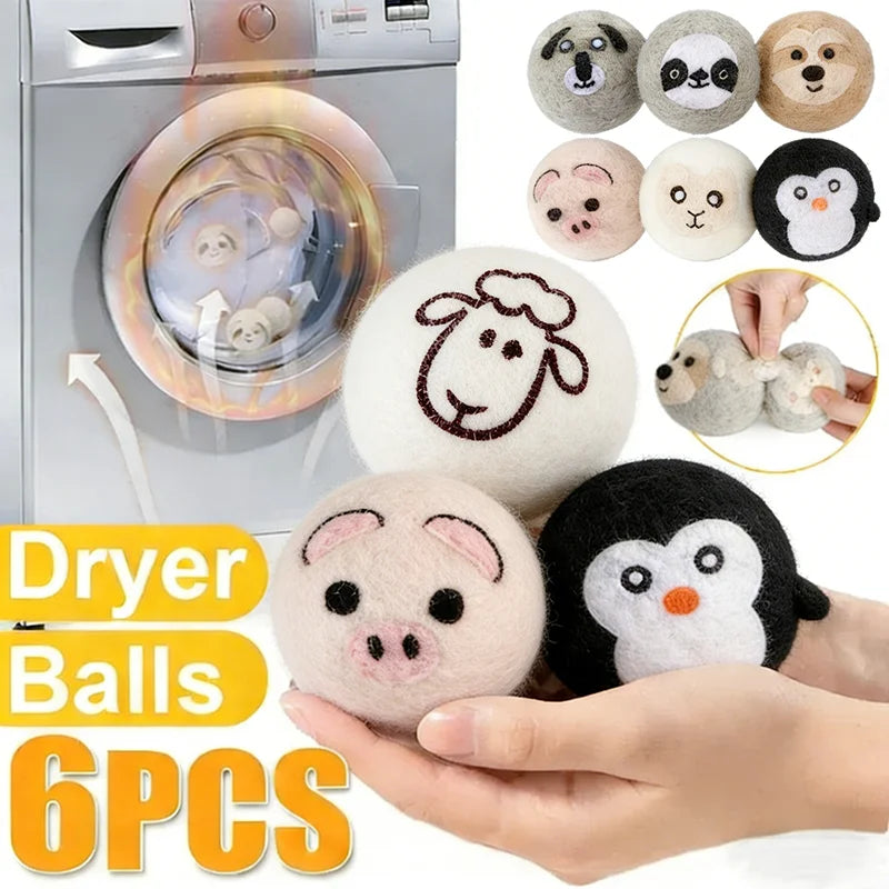 A set of six reusable wool dryer balls featuring various animal shapes like a panda, pig, and bear, displayed next to a dryer