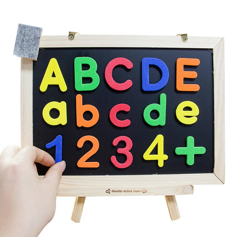 A wooden magnetic alphabet learning set showing uppercase and lowercase letters and numbers on a chalkboard