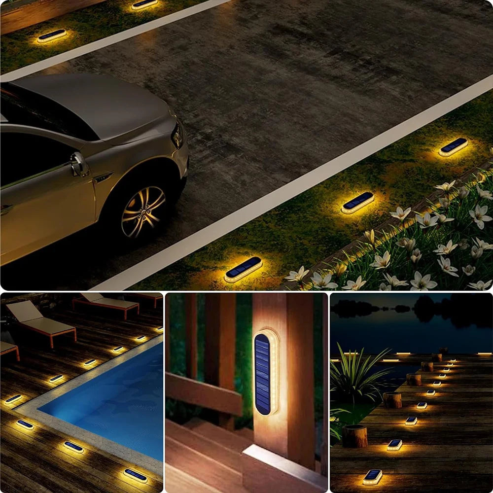 A series of solar powered LED step and path lights illuminating a pathway and steps.