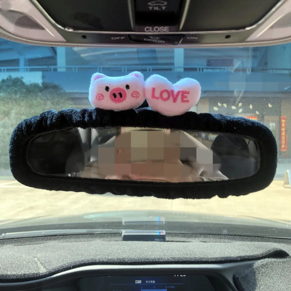 Plush bear and pig shaped covers for car rearview mirrors