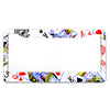 A white aluminum license plate frame decorated with various playing card symbols and patterns.