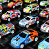 A collection of colorful mini pull-back toy cars, including red, yellow, and orange models, displayed on a dark surface.