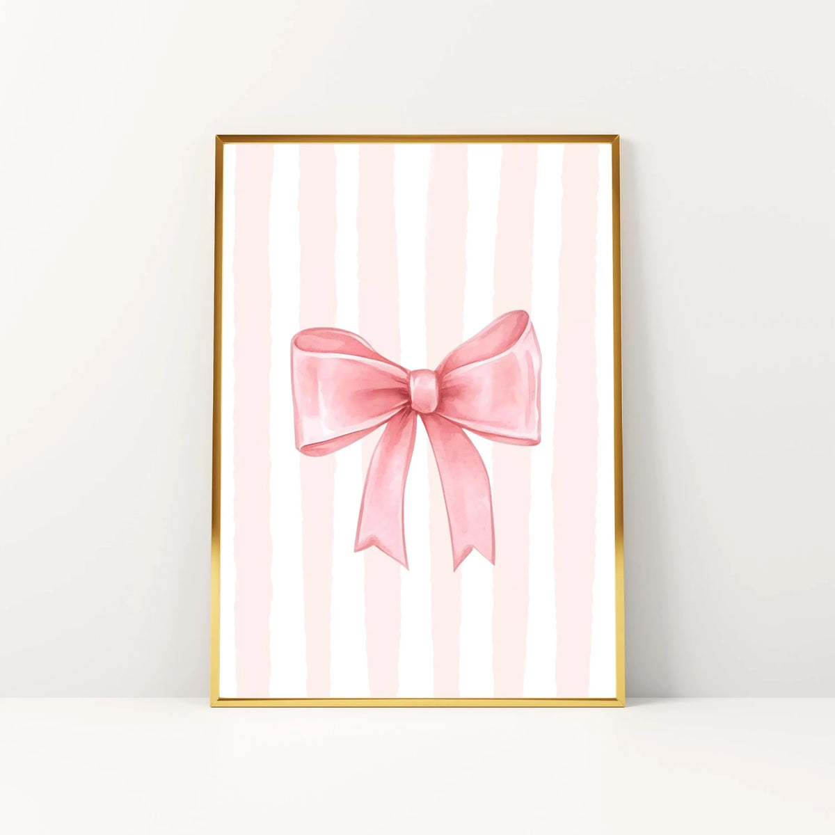 Pink bow canvas print featuring vertical stripes in soft pink and white on a gold frame.