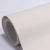 Roll of beige self-adhesive PU leather repair patches, showing the texture and thickness.