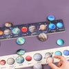 A wooden solar system puzzle featuring planets like Mercury, Venus, Earth, Mars, Jupiter, Saturn, Uranus, and Neptune.