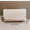 A rectangular clutch bag made of light pink patent leather with vertical pleats and a gold chain strap.
