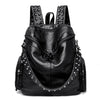 Black soft leather backpack with silver rivets and decorative studs
