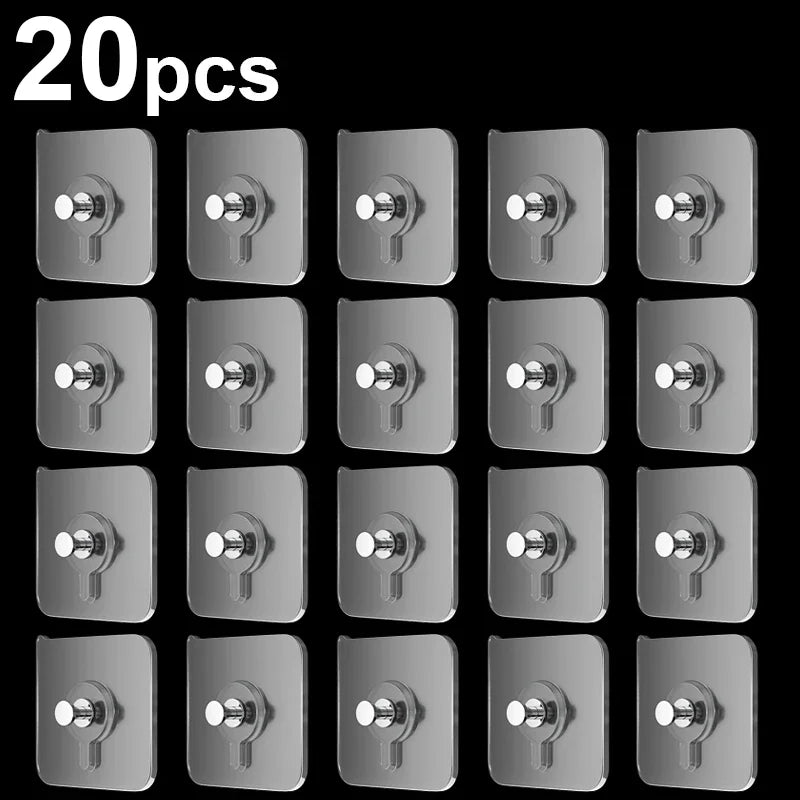 A set of twenty silver self-adhesive wall hooks for hanging frames and photos.