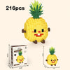 A set of 216 yellow micro building blocks forming a pineapple dessert figurine with a smiling face.