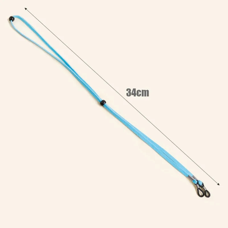 A blue adjustable soft eyewear lanyard with a 34cm length is shown.