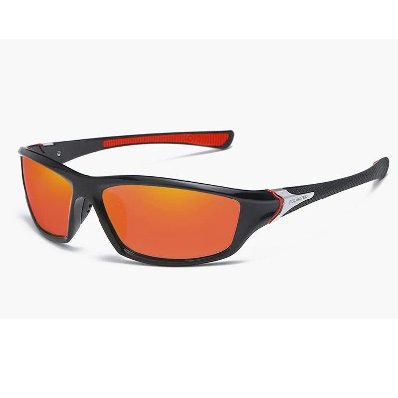 A pair of black polarized sports sunglasses with an orange lens and a red accent on the temple.