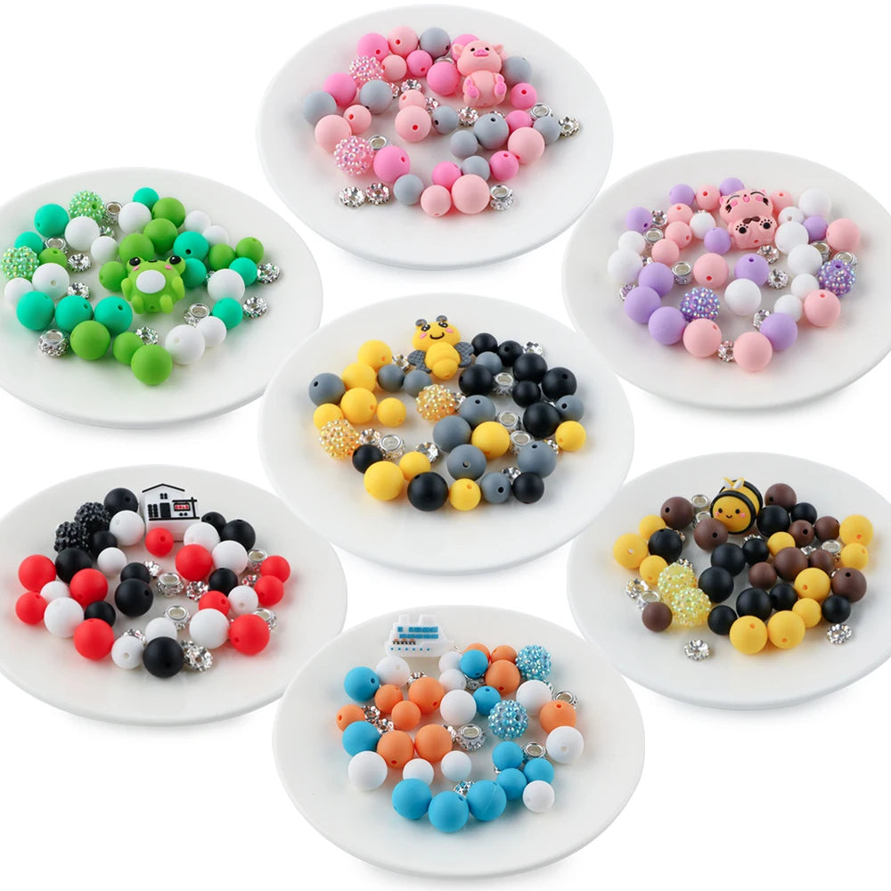 A collection of 45 round silicone beads in various colors and animal shapes for jewelry making.