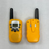 A pair of yellow walkie talkie sets with black antennas and flashlights are displayed on a gray surface.