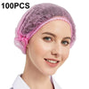 A woman is modeling a purple disposable non-woven bouffant cap with an elastic band on her head.