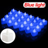 A display of blue light heart-shaped flameless LED candles arranged in a row.