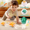 An interactive musical dancing toy with light show featuring orange and green figures for children's play.