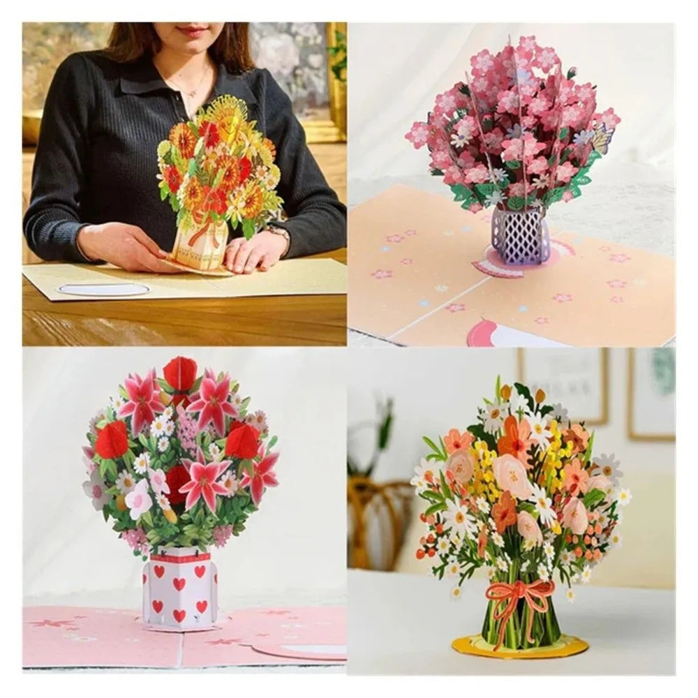 A pink and red cherry blossom bouquet displayed in a glass vase on a light pink surface.