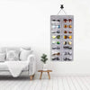 A grey felt eyewear organizer with sixteen slots is mounted on a white wall above a sofa.
