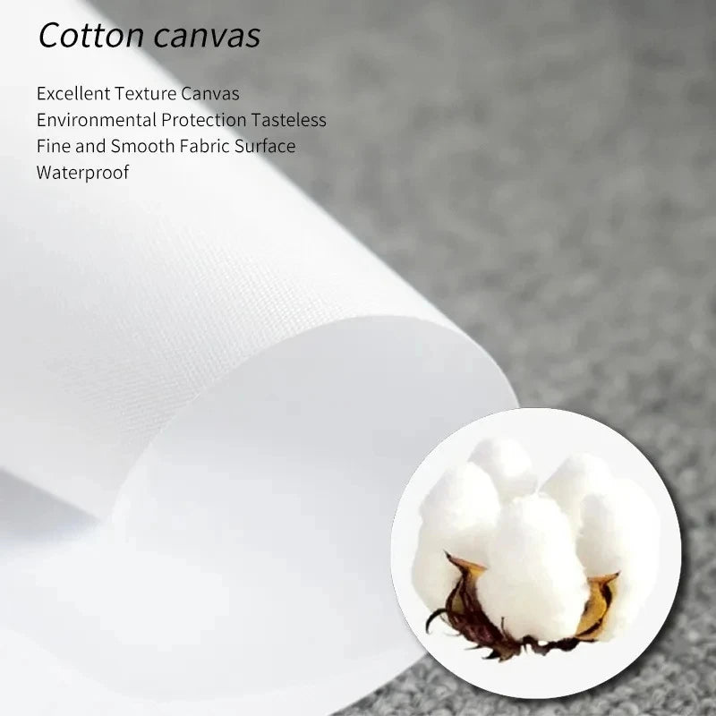 A roll of white cotton canvas material with a small piece of brown fabric visible.