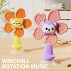 A set of pink and orange windmill rotation music toys shaped like a lion and a monkey, featuring suction cups.