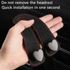 A hand holds a black car seat headrest hook with dual heart-shaped grips for quick installation.